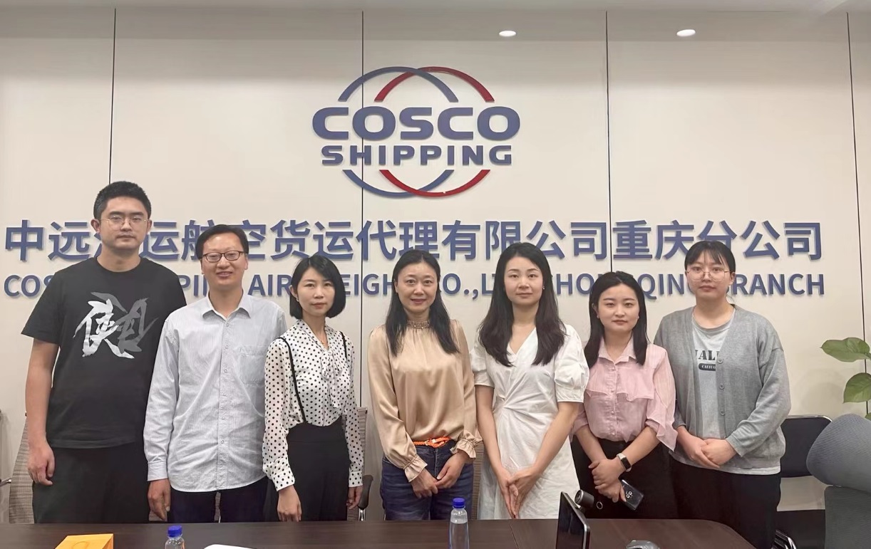 A group of people posing for a photoDescription automatically generated